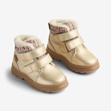 Gold winter boots hotsell